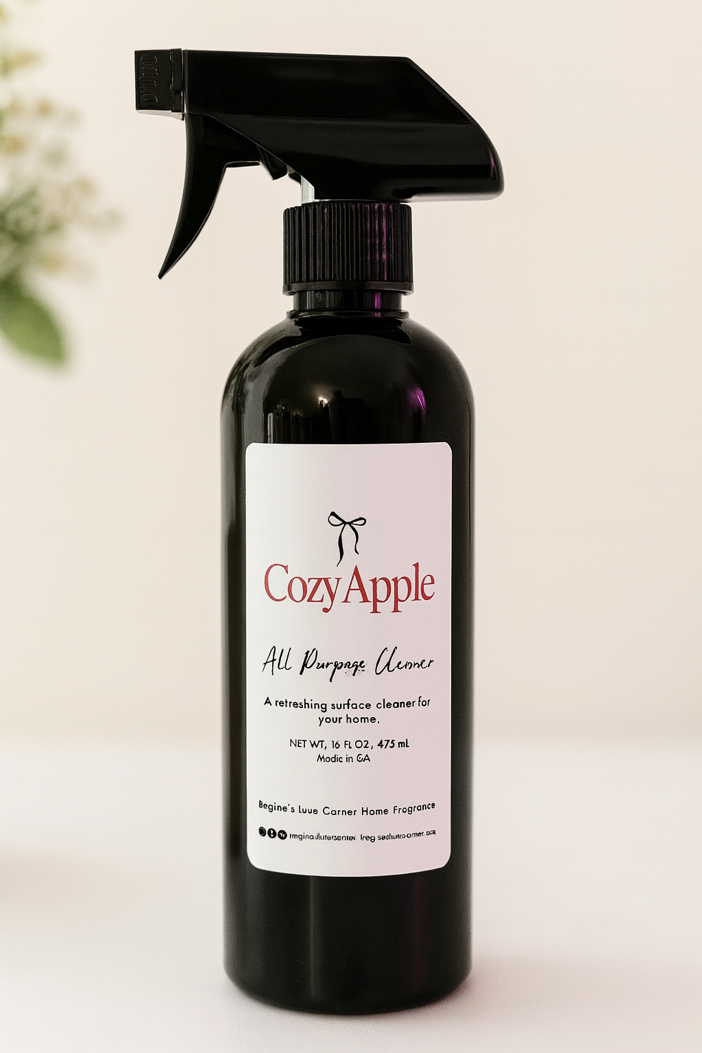 CozyApple all purpose cleaner spray bottle with a minimalist design, perfect for home use.